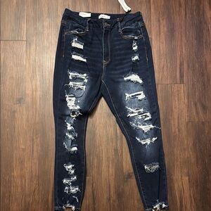 Distressed Dark Blue Jeans
